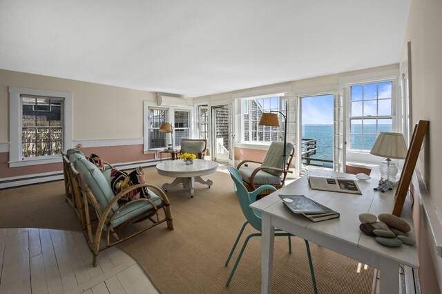 561 Commercial St, Provincetown, MA 02657 - office featuring a water view, an AC wall unit, plenty of natural light, and wood finished floors