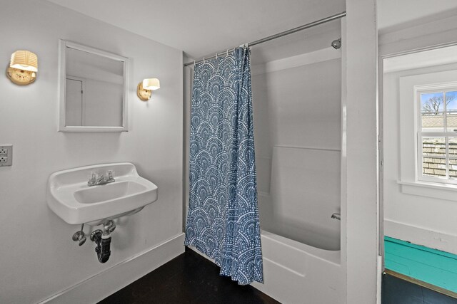 561 Commercial St, Provincetown, MA 02657 - full bathroom featuring shower / bathtub combination with curtain and baseboards