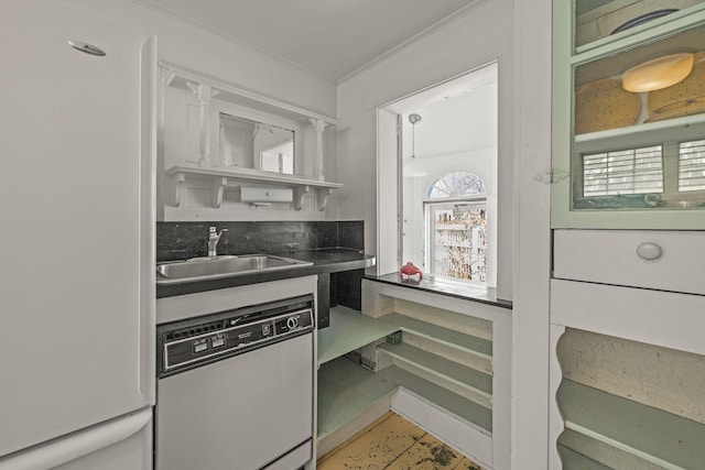 561 Commercial St, Provincetown, MA 02657 - kitchen with open shelves, a sink, ornamental molding, dark countertops, and white appliances