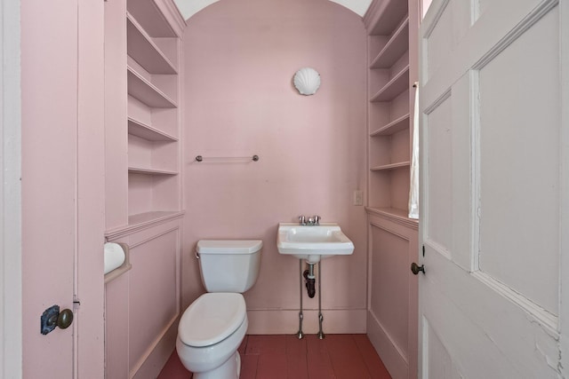561 Commercial St, Provincetown, MA 02657 - half bathroom featuring toilet and a sink