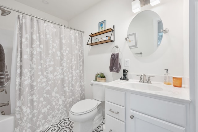 bathroom with vanity, toilet, and a shower with curtain