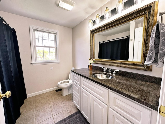 121 Camp St Unit 108, West Yarmouth, MA 02673 - full bathroom featuring vanity, toilet, baseboards, tile patterned flooring, and a shower with shower curtain