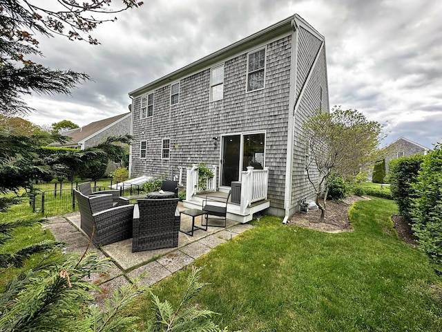 121 Camp St Unit 108, West Yarmouth, MA 02673 - back of property with a patio area