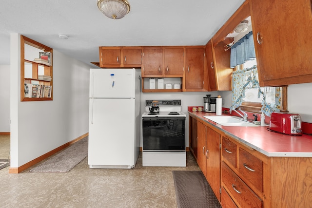 64 Uncle Percys Rd, Mashpee, MA 02649 - kitchen featuring freestanding refrigerator, electric range oven, a sink, brown cabinets, and light countertops