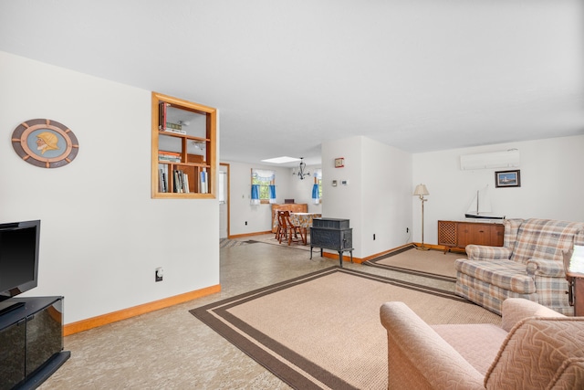 64 Uncle Percys Rd, Mashpee, MA 02649 - living area with a wall unit AC, baseboards, and carpet