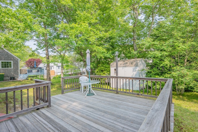 64 Uncle Percys Rd, Mashpee, MA 02649 - wooden terrace with a lawn