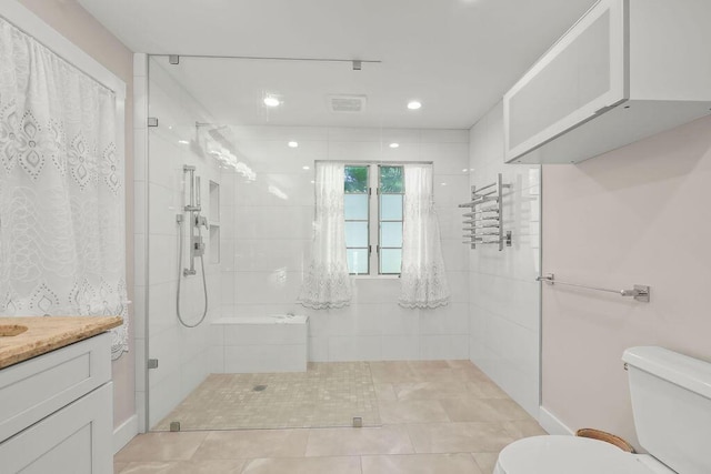 34 Marla Ln, Hatchville, MA 02536 - bathroom featuring toilet, walk in shower, vanity, tile patterned floors, and recessed lighting