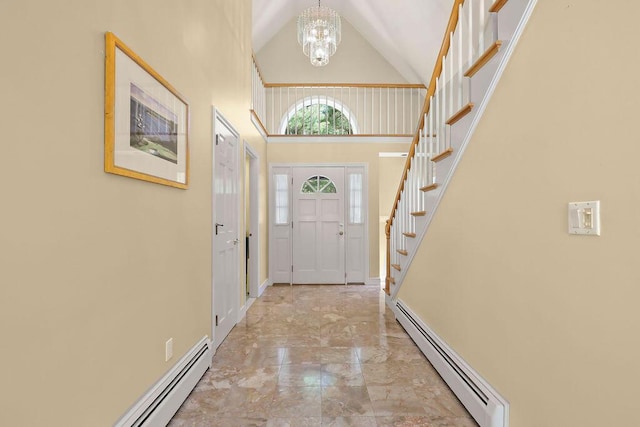 34 Marla Ln, Hatchville, MA 02536 - entryway featuring a baseboard heating unit, a chandelier, stairs, marble finish flooring, and high vaulted ceiling