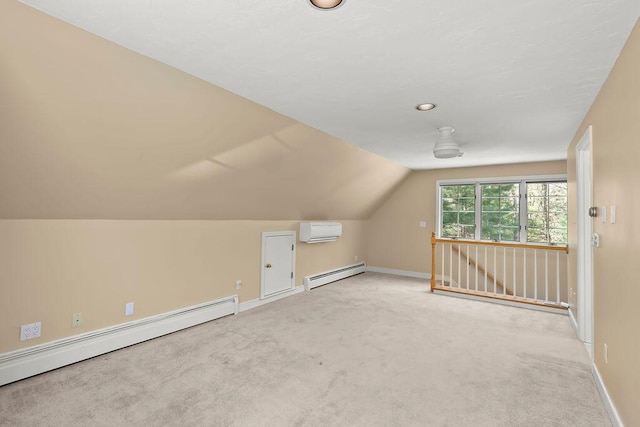 34 Marla Ln, Hatchville, MA 02536 - bonus room with baseboard heating, a baseboard heating unit, a wall mounted air conditioner, carpet floors, and vaulted ceiling