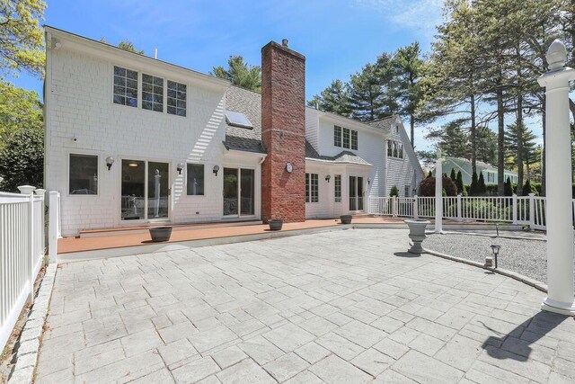 34 Marla Ln, Hatchville, MA 02536 - rear view of property with a chimney, a patio, and a deck