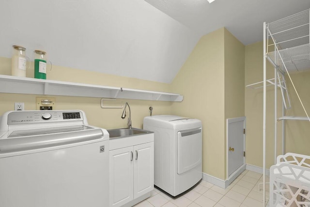 34 Marla Ln, Hatchville, MA 02536 - clothes washing area with independent washer and dryer, cabinet space, light tile patterned flooring, and baseboards
