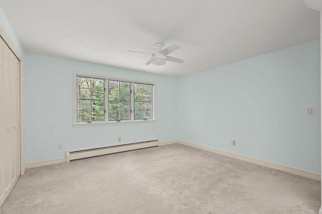 34 Marla Ln, Hatchville, MA 02536 - unfurnished bedroom featuring a baseboard heating unit, a closet, carpet floors, baseboards, and a ceiling fan