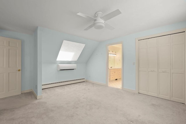 34 Marla Ln, Hatchville, MA 02536 - additional living space with a baseboard radiator, an AC wall unit, carpet, baseboards, and lofted ceiling