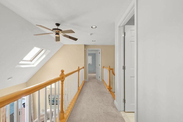 34 Marla Ln, Hatchville, MA 02536 - hall with a skylight, vaulted ceiling, light carpet, recessed lighting, and a baseboard heating unit