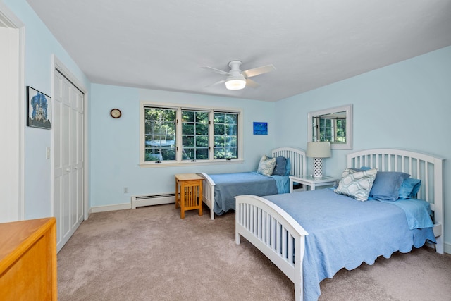 34 Marla Ln, Hatchville, MA 02536 - carpeted bedroom featuring a baseboard radiator, a closet, a ceiling fan, and baseboards