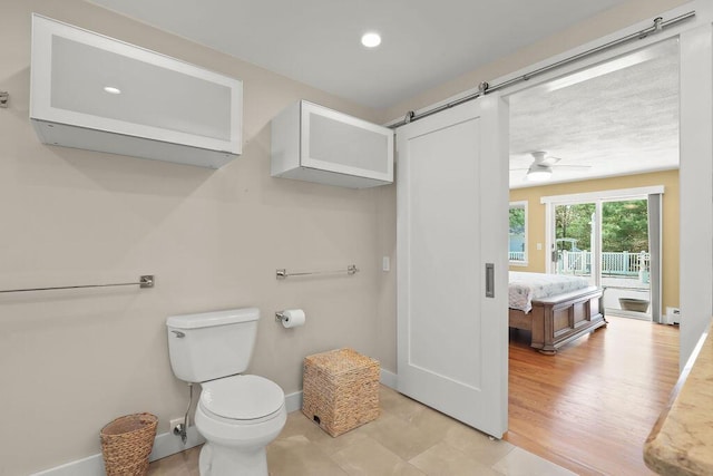 34 Marla Ln, Hatchville, MA 02536 - bathroom featuring baseboards, toilet, ceiling fan, recessed lighting, and a baseboard heating unit