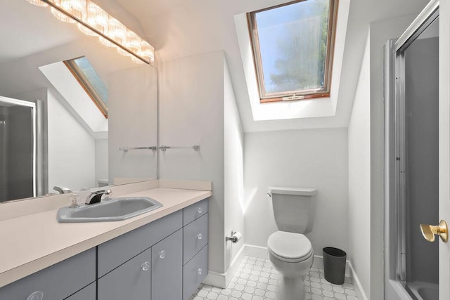 34 Marla Ln, Hatchville, MA 02536 - bathroom featuring a skylight, toilet, a stall shower, vanity, and baseboards