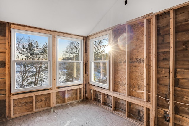 unfurnished sunroom with vaulted ceiling