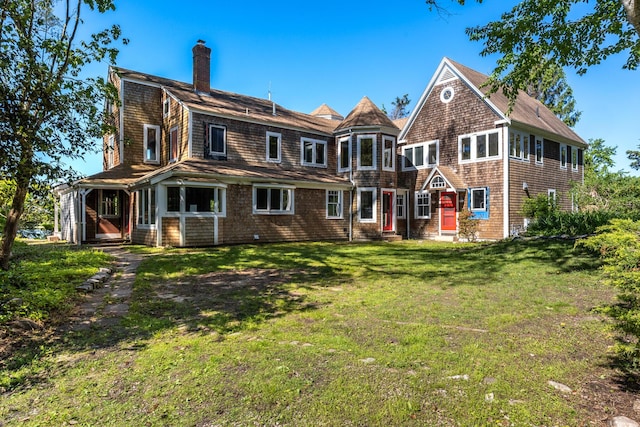 10 Squeteague Harbor Rd, Cataumet, MA 02534 - rear view of property featuring a chimney and a yard