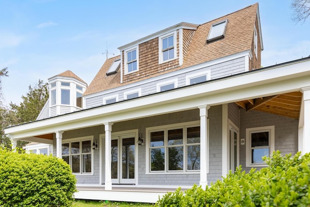 10 Squeteague Harbor Rd, Cataumet, MA 02534 - back of property featuring a porch and a shingled roof