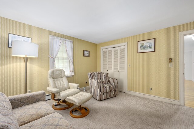 105 Rolling Hitch Rd, Centerville, MA 02632 - living area featuring a baseboard heating unit, wallpapered walls, baseboards, and carpet flooring
