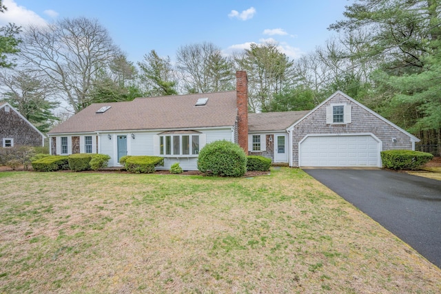 105 Rolling Hitch Rd, Centerville, MA 02632 - view of front of home with an attached garage, a front lawn, aphalt driveway, and a chimney