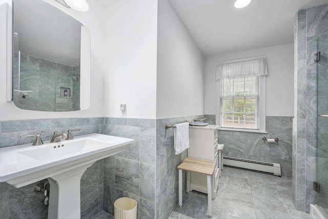 105 Rolling Hitch Rd, Centerville, MA 02632 - full bath with a baseboard heating unit, tile walls, a wainscoted wall, and a stall shower