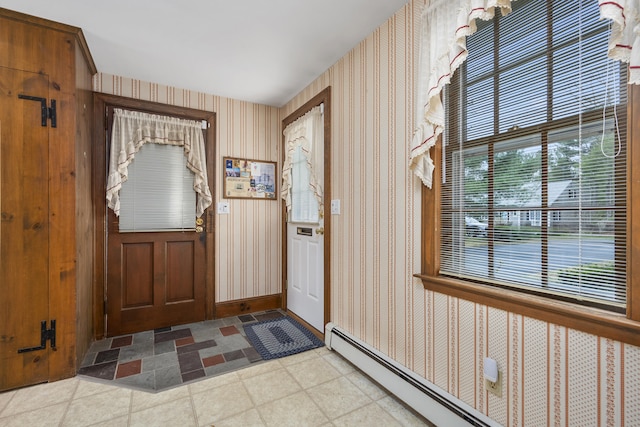 105 Rolling Hitch Rd, Centerville, MA 02632 - entryway with baseboard heating, baseboards, and wallpapered walls