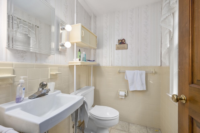 105 Rolling Hitch Rd, Centerville, MA 02632 - half bath featuring tile walls, wallpapered walls, tile patterned flooring, and toilet