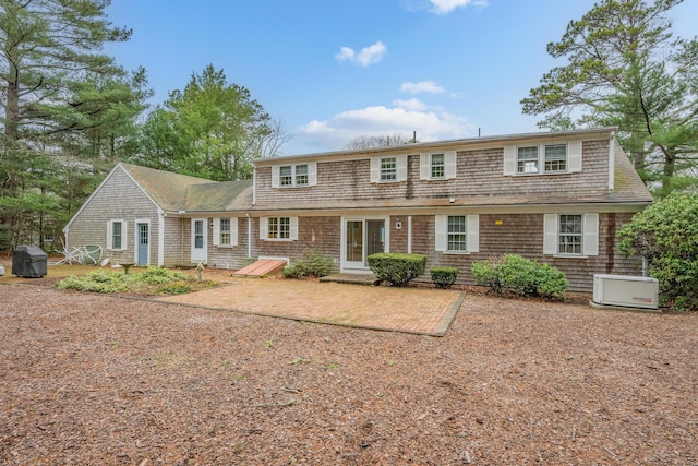 105 Rolling Hitch Rd, Centerville, MA 02632 - rear view of property featuring a patio