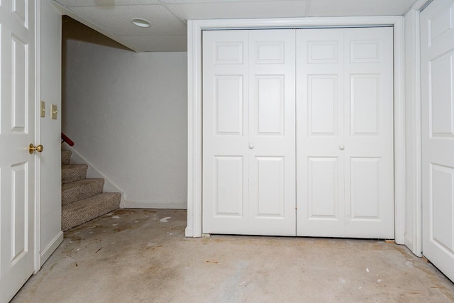 interior space featuring a closet and concrete floors