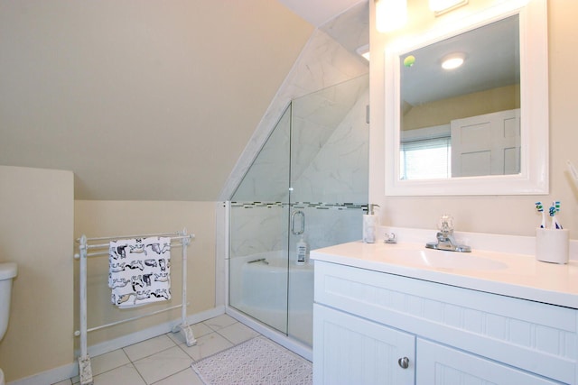 full bathroom featuring a shower stall, vaulted ceiling, vanity, baseboards, and toilet