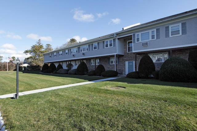 view of front of home with a front lawn