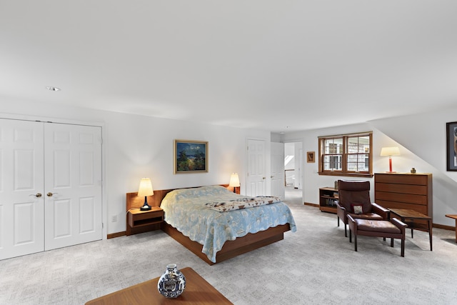 bedroom with baseboards and carpet floors