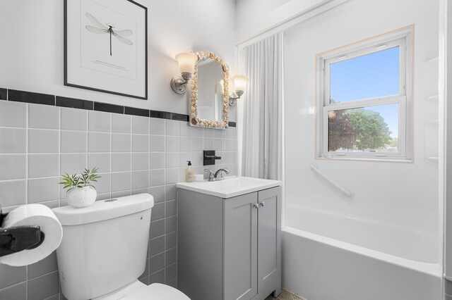 30 Terry Ct, Hyannis, MA 02601 - full bathroom featuring vanity, tile walls, and shower / bath combination