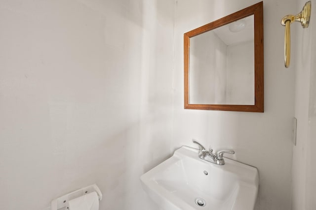 bathroom with a sink and toilet