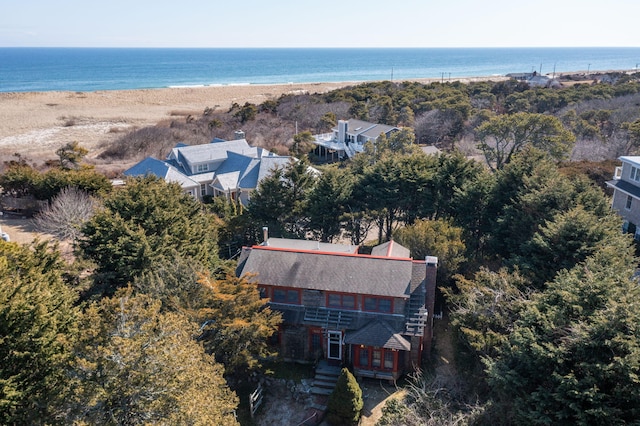 aerial view featuring a water view and a beach view