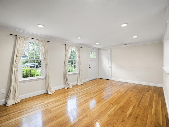 9 Cogswell Path, West Yarmouth, MA 02673 - entrance foyer featuring ornamental molding, baseboards, light wood finished floors, and recessed lighting