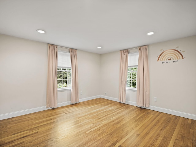 9 Cogswell Path, West Yarmouth, MA 02673 - empty room featuring healthy amount of natural light, wood finished floors, baseboards, and recessed lighting