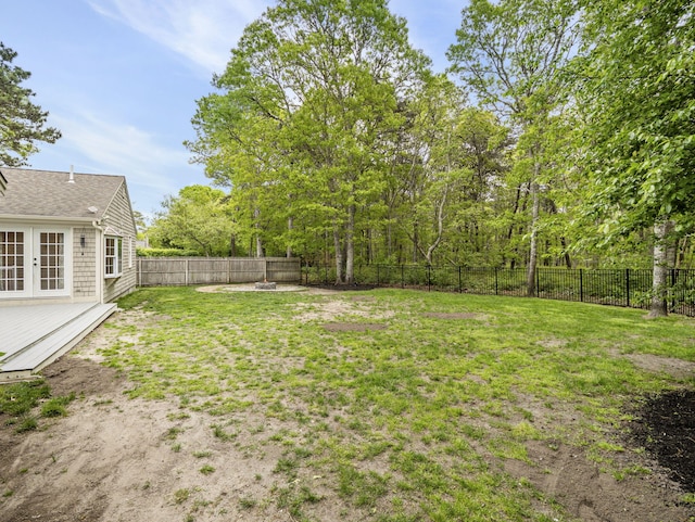 9 Cogswell Path, West Yarmouth, MA 02673 - view of yard with a wooden deck and french doors