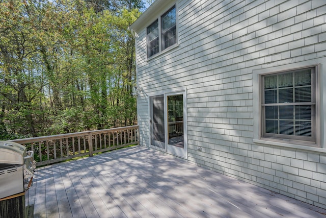 wooden terrace with grilling area
