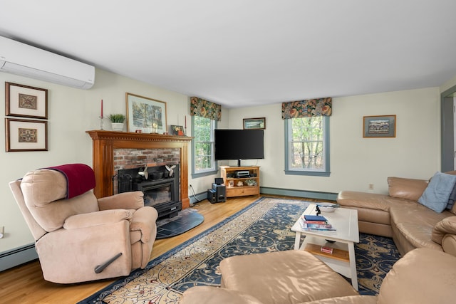 living room featuring baseboard heating, a wall mounted AC, wood finished floors, and a baseboard radiator