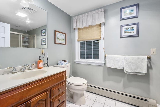 full bath featuring baseboard heating, tile patterned flooring, a shower stall, vanity, and toilet