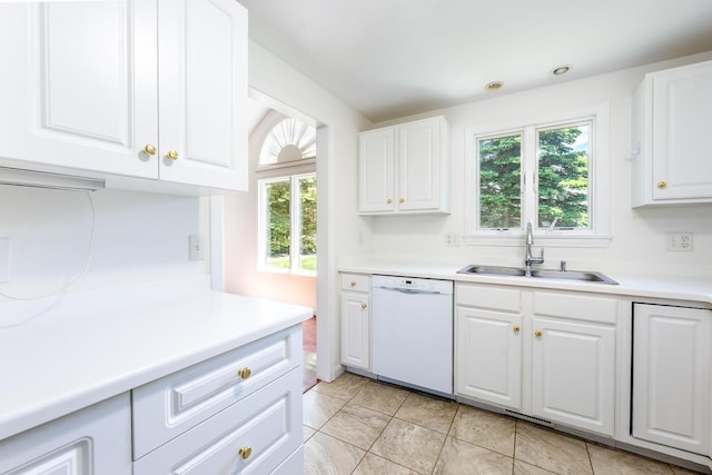9 Longwood Rd, Mashpee, MA 02649 - kitchen with white dishwasher, a sink, plenty of natural light, and white cabinetry