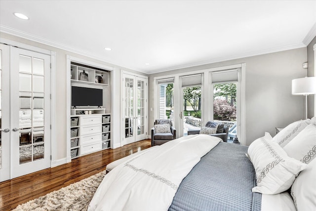 bedroom featuring french doors, access to exterior, ornamental molding, and wood finished floors