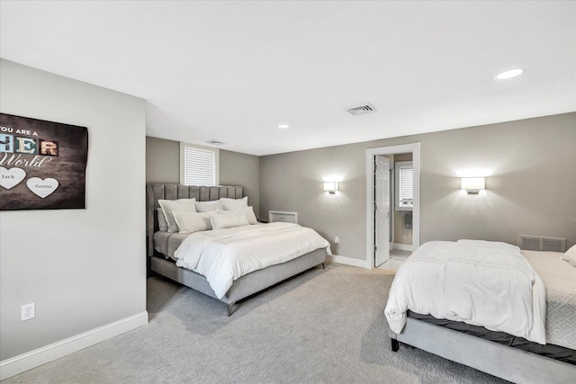 bedroom featuring baseboards, carpet, and visible vents