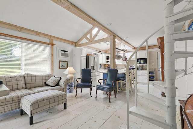 130 Wimbledon Dr, West Yarmouth, MA 02673 - living area featuring a wall mounted air conditioner and light wood-style floors