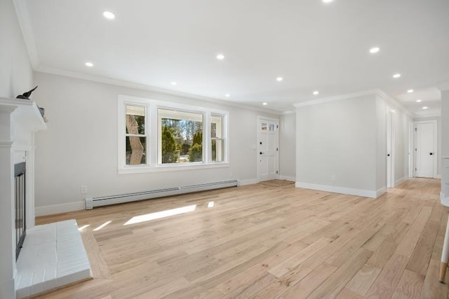 unfurnished living room featuring ornamental molding, a baseboard heating unit, recessed lighting, light wood finished floors, and baseboards