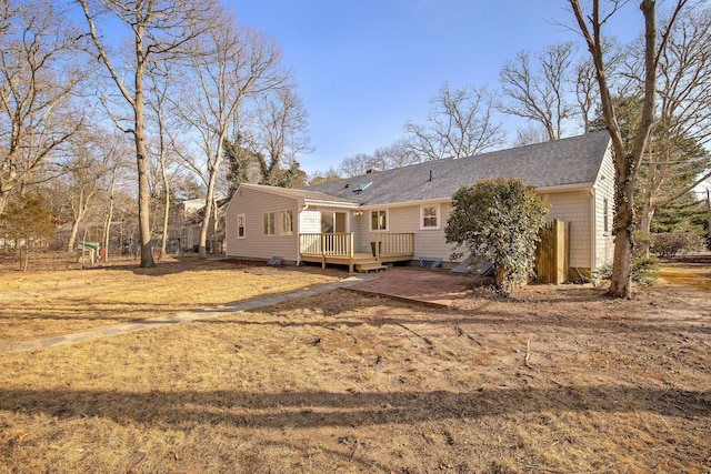 rear view of property with a deck