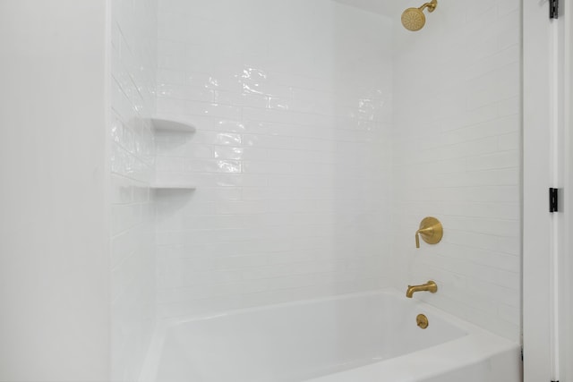 bathroom with washtub / shower combination